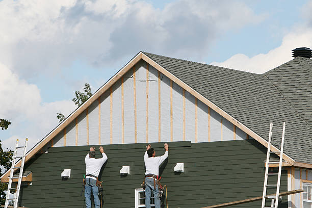 Professional Emergency Siding Repair technician working in Hayes, VA